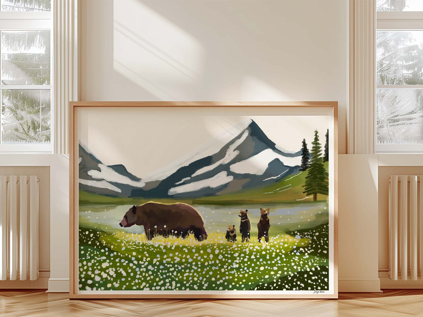 Curious bear cubs in a serene wilderness with green grass and snow-capped mountains.