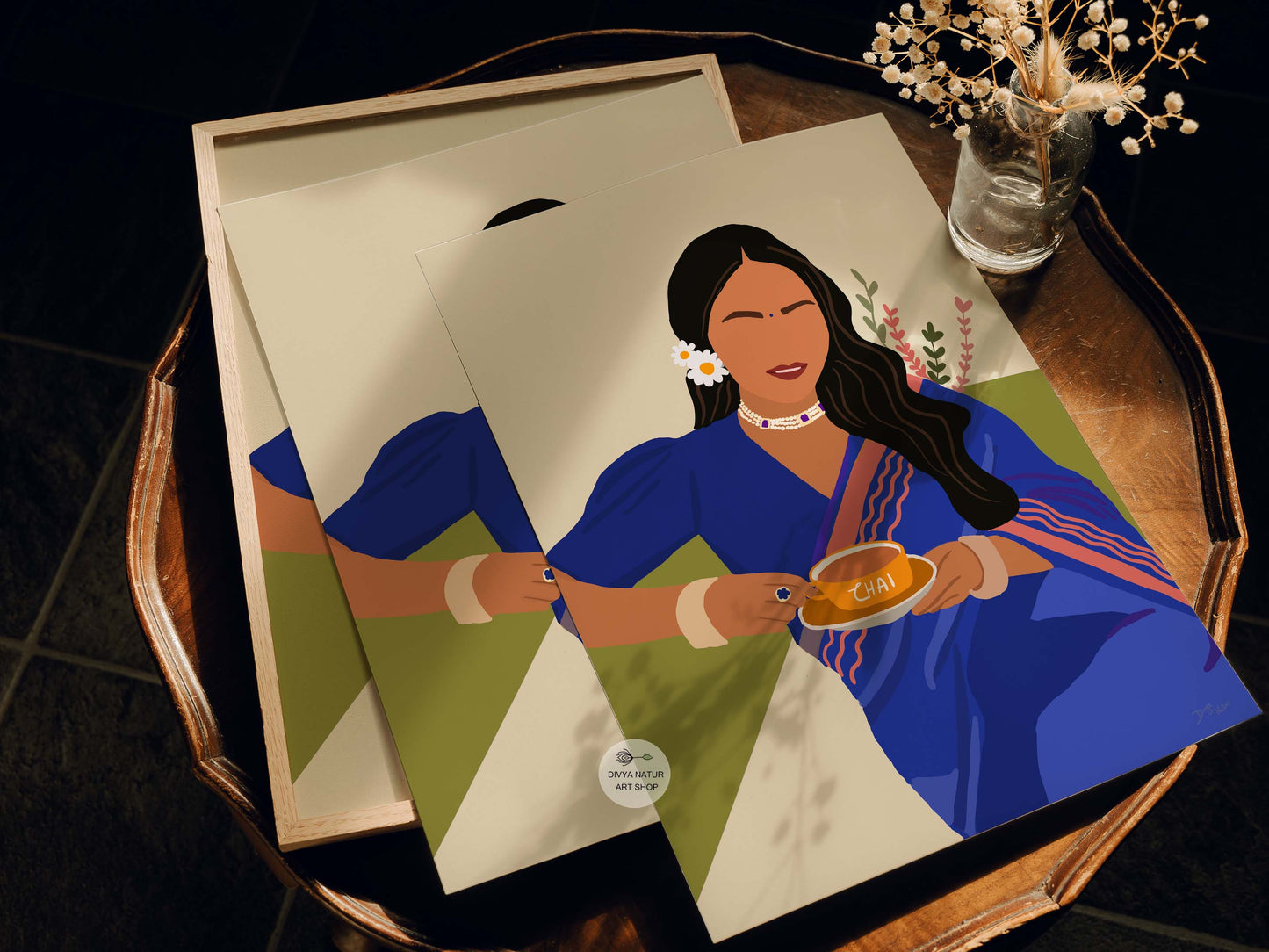 Bold and colorful Indian chai art featuring a woman in traditional attire.