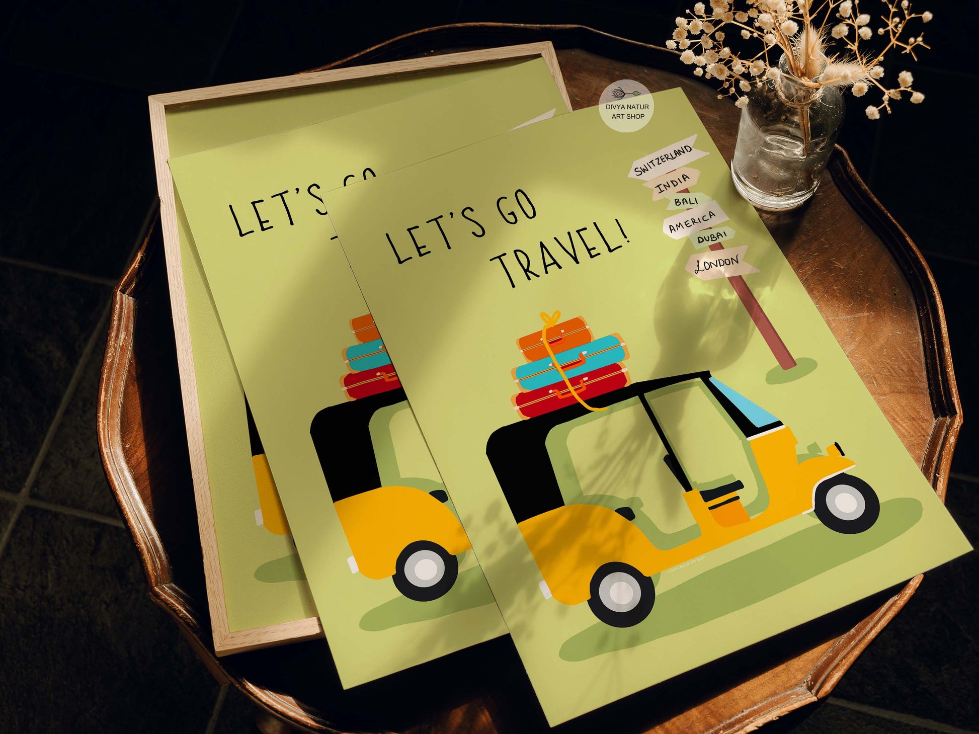 Adventure-themed wall art with a rickshaw pointing to dream destinations.