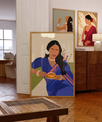 Chai lover's art print featuring a woman in a blue saree with chai.